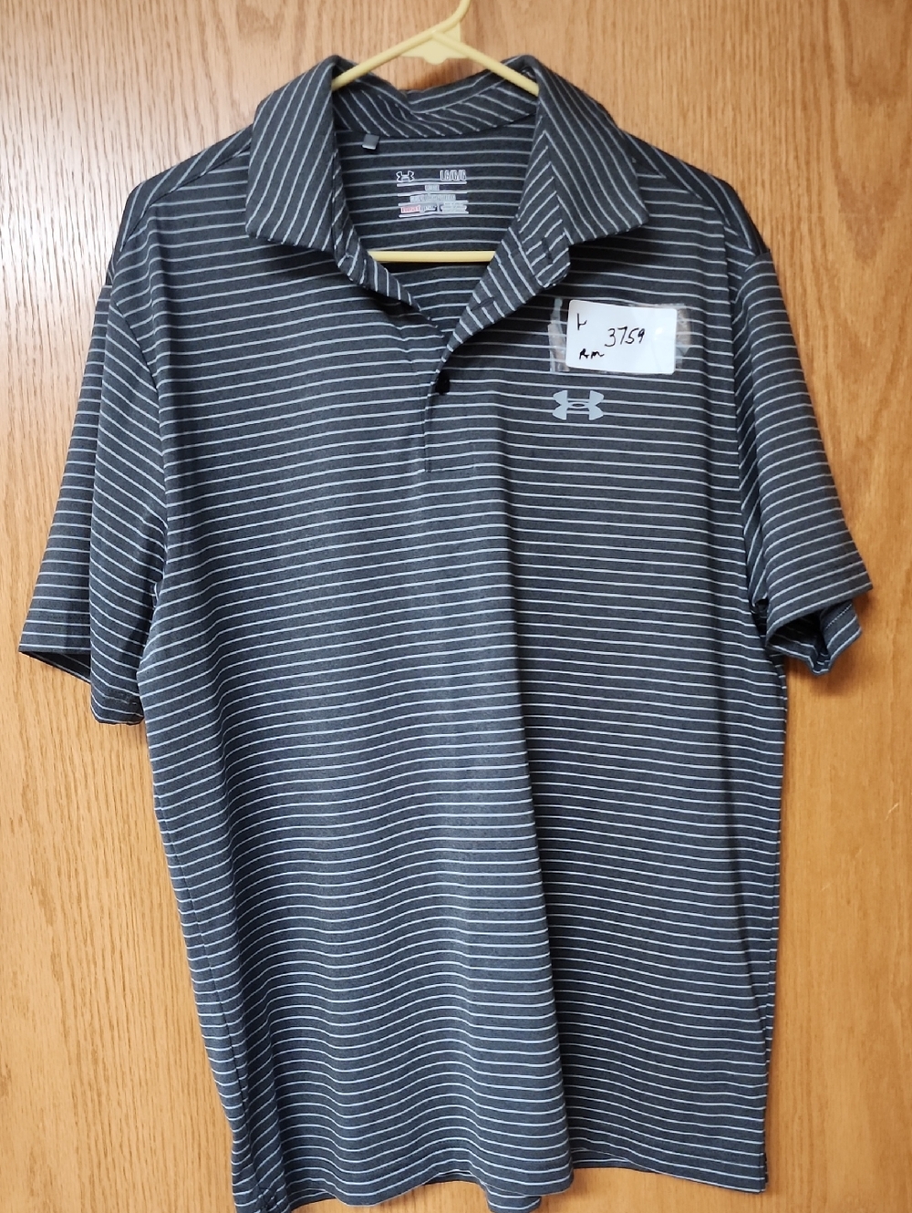 Under Armour Men’s Black and White Striped Polo L number 3759